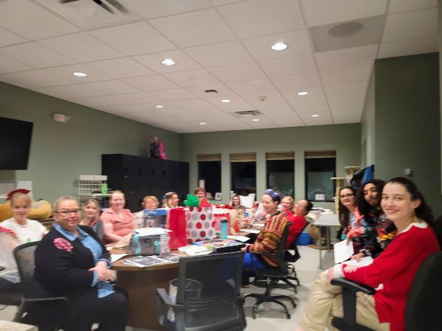 Sugar River Animal Hospital team members enjoying the holiday party